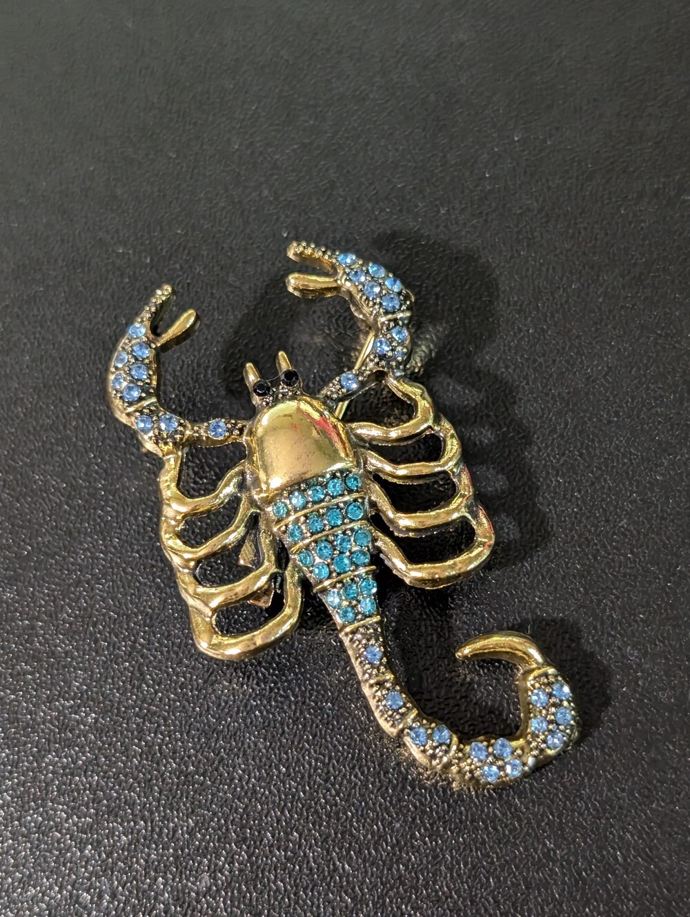 Gold-Tone Scorpion Brooch with Blue Crystals